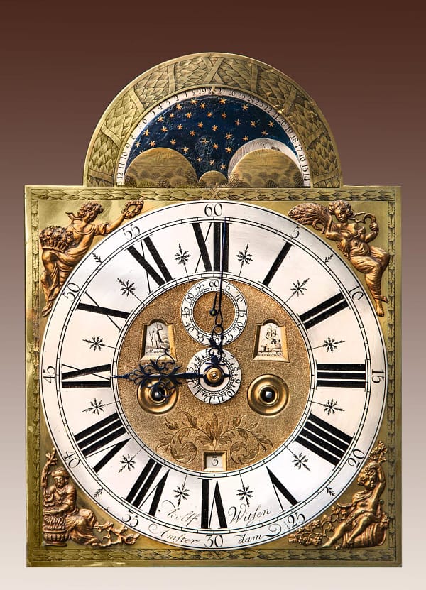 Amsterdams staand horloge Staand horloge met een noten- en wortelnoten-hout gefineerde kast. Gesigneerd Adolf Witsen, Amsterdam. Wijzerplaat.